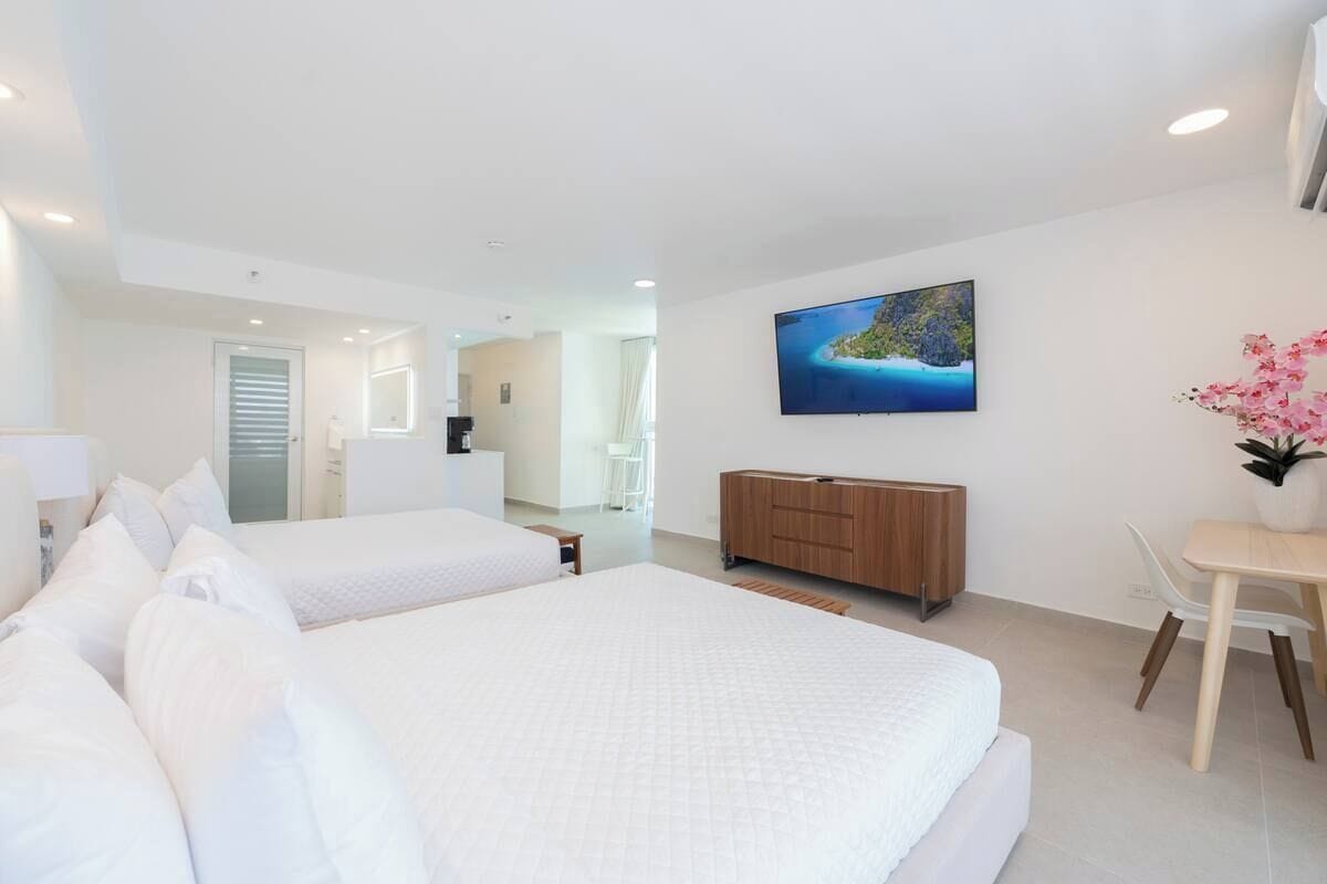 In-room safe, laptop workspace, blackout curtains, iron/ironing board
