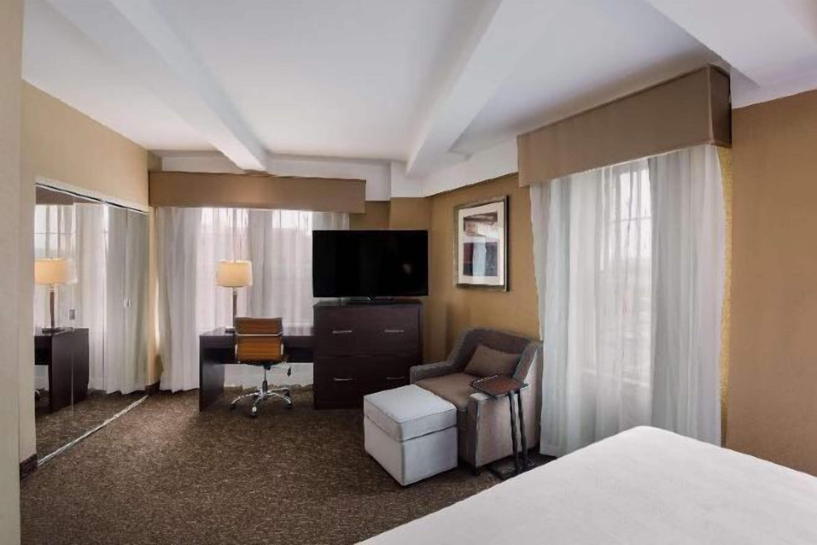 Premium bedding, pillowtop beds, desk, laptop workspace