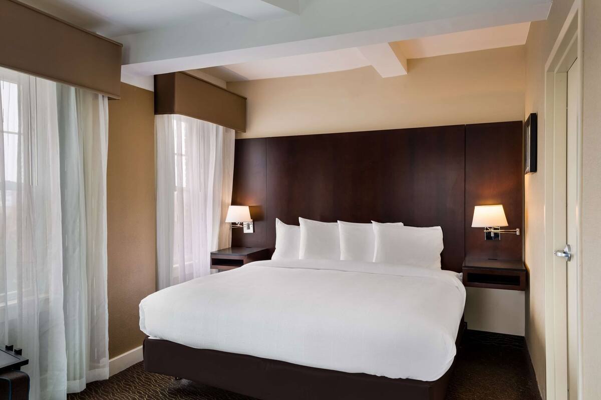 Premium bedding, pillow-top beds, desk, laptop workspace