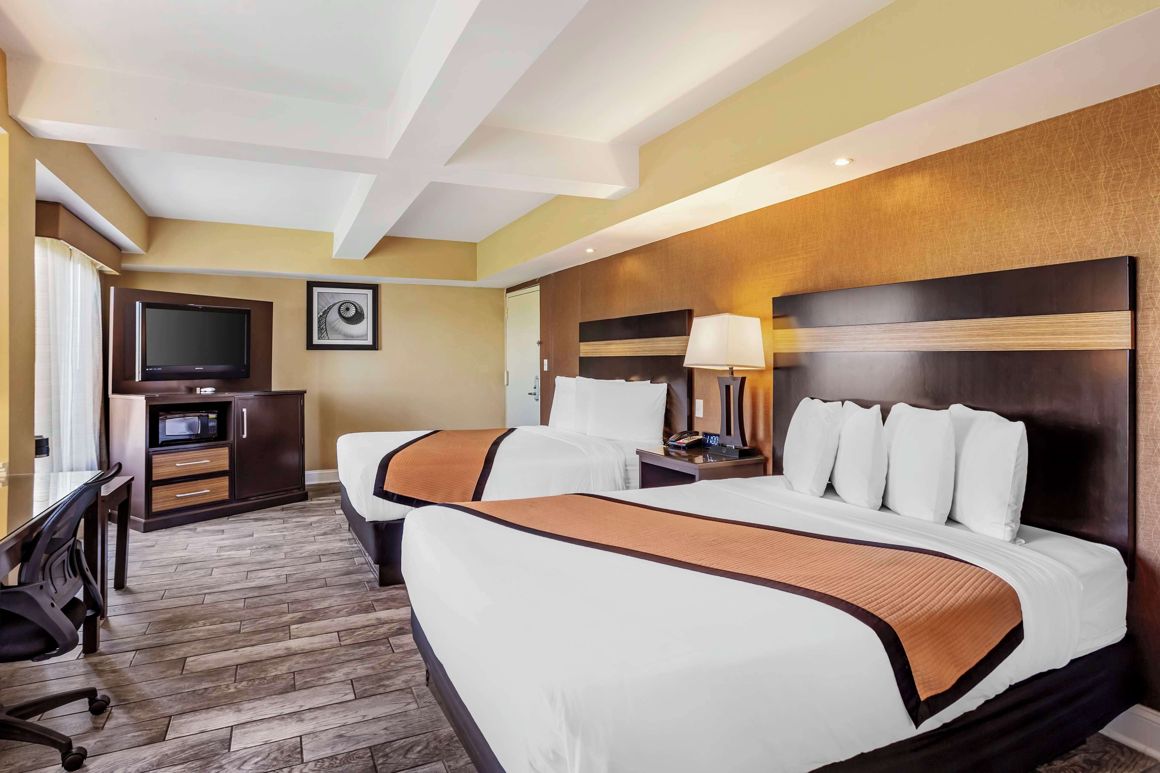 standard room, multiple beds, non smoking, jetted tub (with sofabed) | in-room safe, desk, laptop workspace, blackout curtains