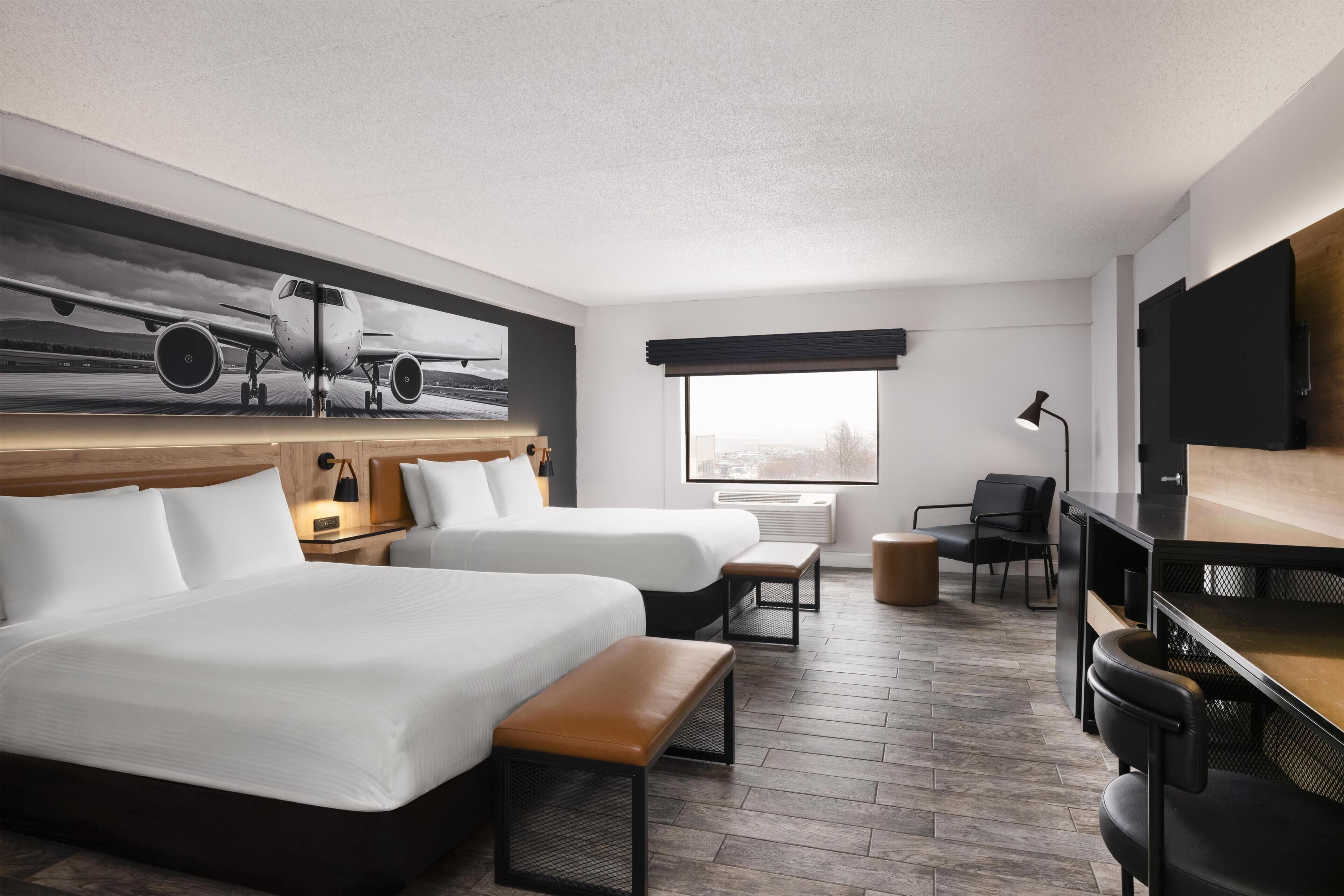 Standard Room, 2 Queen Beds, Refrigerator, City View | In-room safe, desk, laptop workspace, blackout drapes