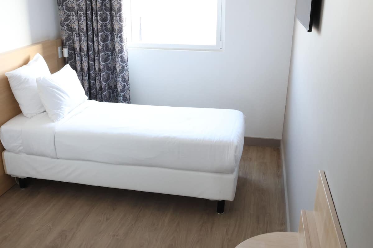 Literie hypoallergénique, lit avec matelas Select Comfort, coffre-fort