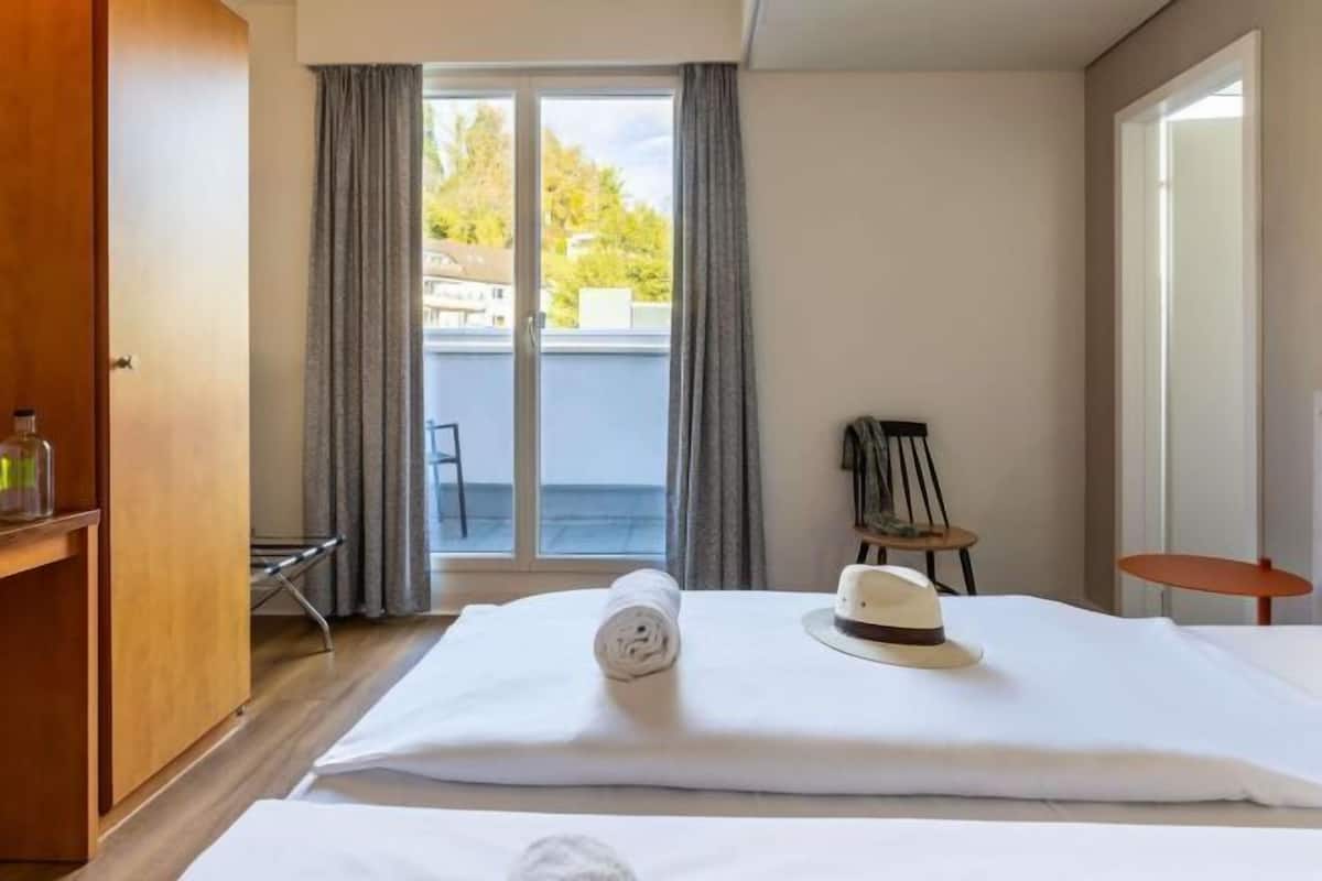 Una cassaforte in camera, una scrivania, Wi-Fi gratuito, lenzuola