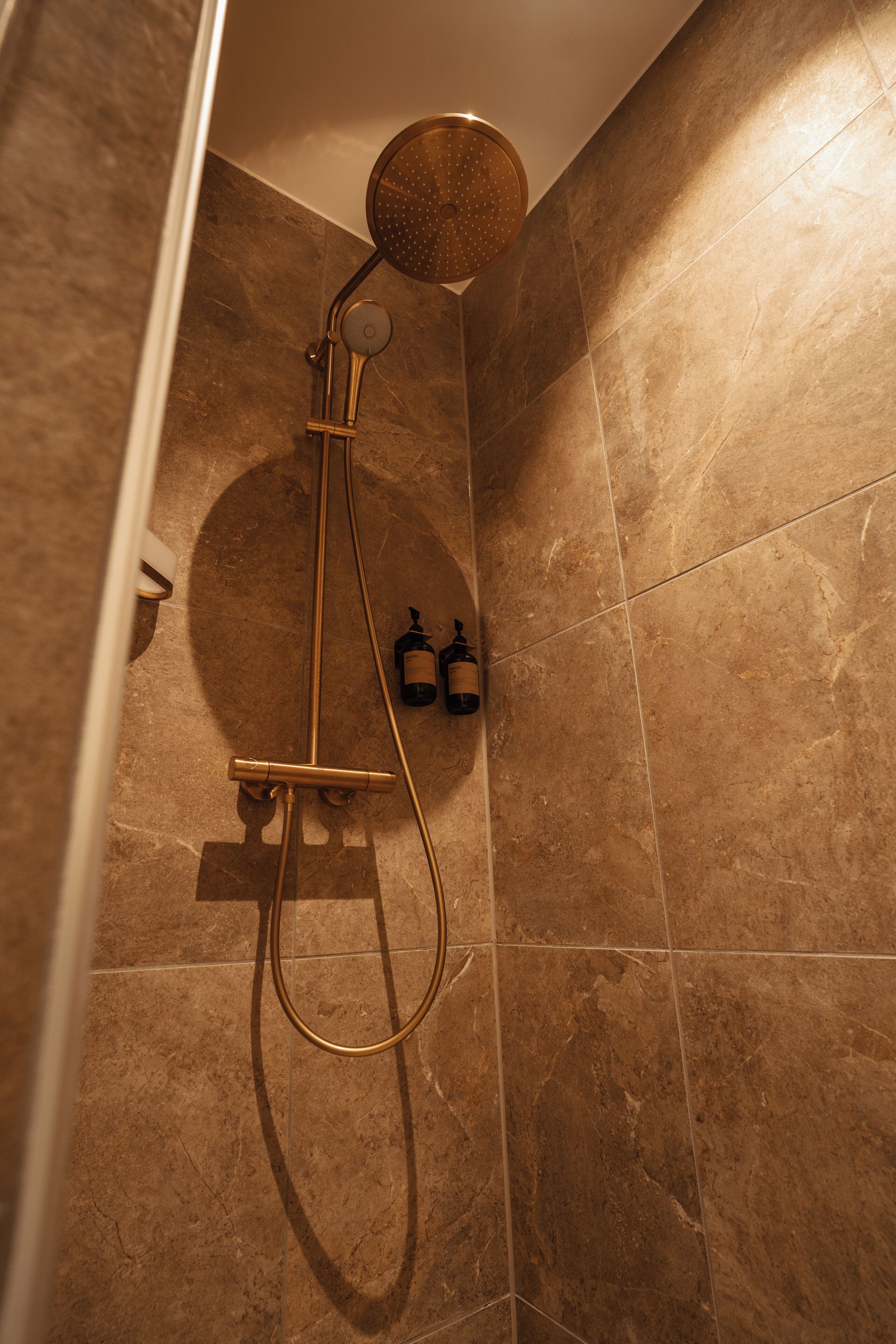 shower, hair dryer, heated floors, towels