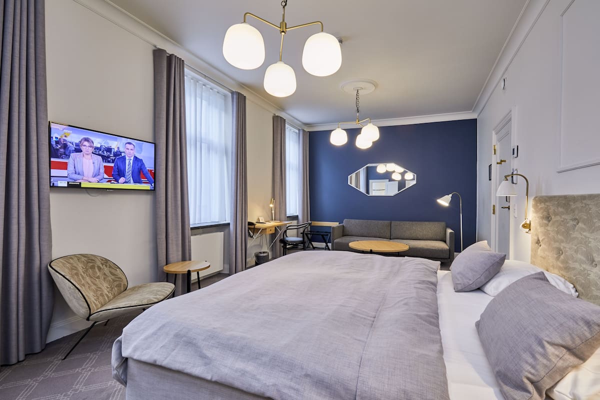 superior quadruple room | down duvets, minibar, in-room safe, individually decorated