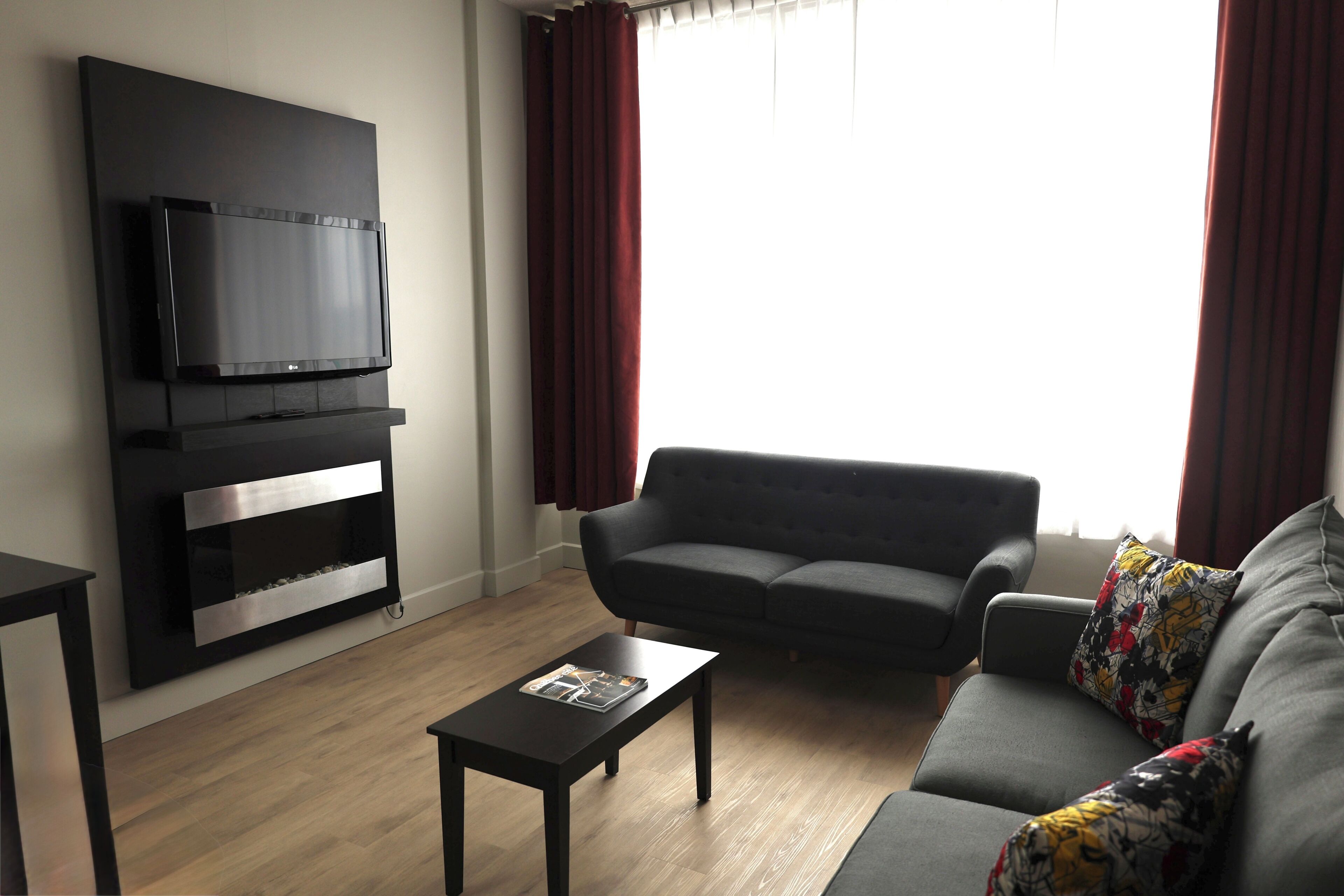 Suite, 1 King Bed with Sofa bed (Distinction) | Living area | 32-inch flat-screen TV with cable channels, TV