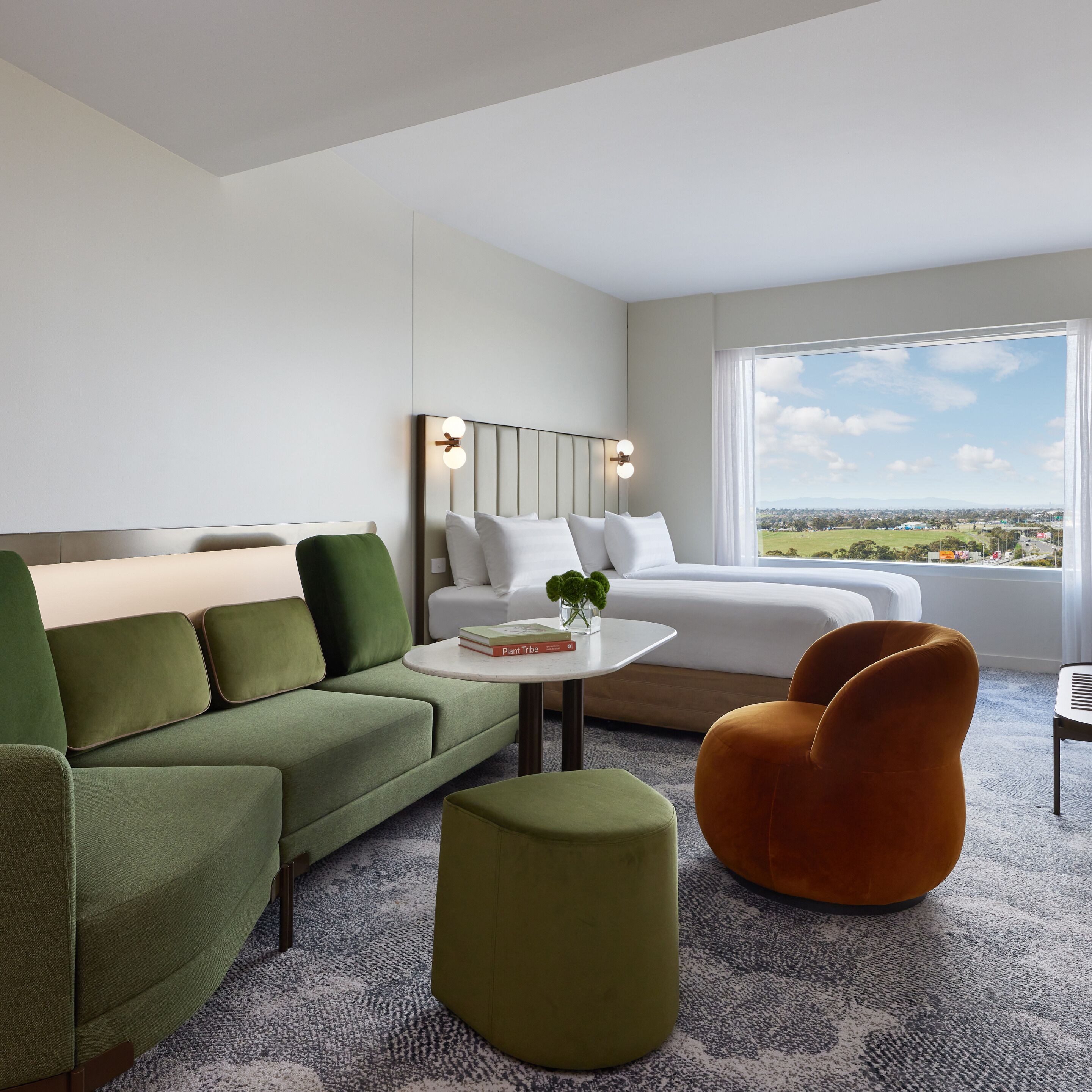 family room | 1 bedroom, premium bedding, minibar, in-room safe