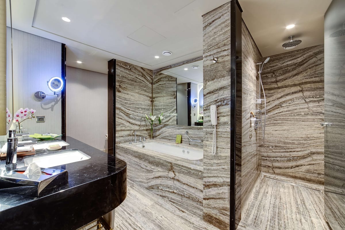 presidential suite | bathroom | separate bathtub and shower, free toiletries, hair dryer, bathrobes