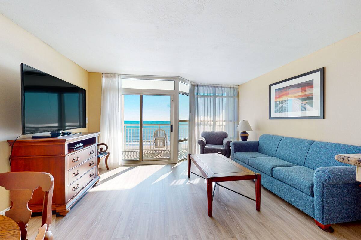 Condo, 1 Bedroom (Oceanfront) | Living area | Flat-screen TV, DVD player