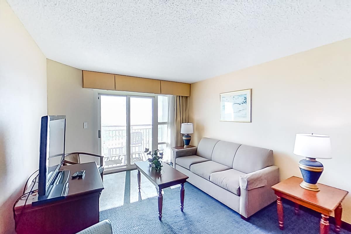 Suite, 2 Bedrooms, Oceanfront | Living area | Flat-screen TV, DVD player