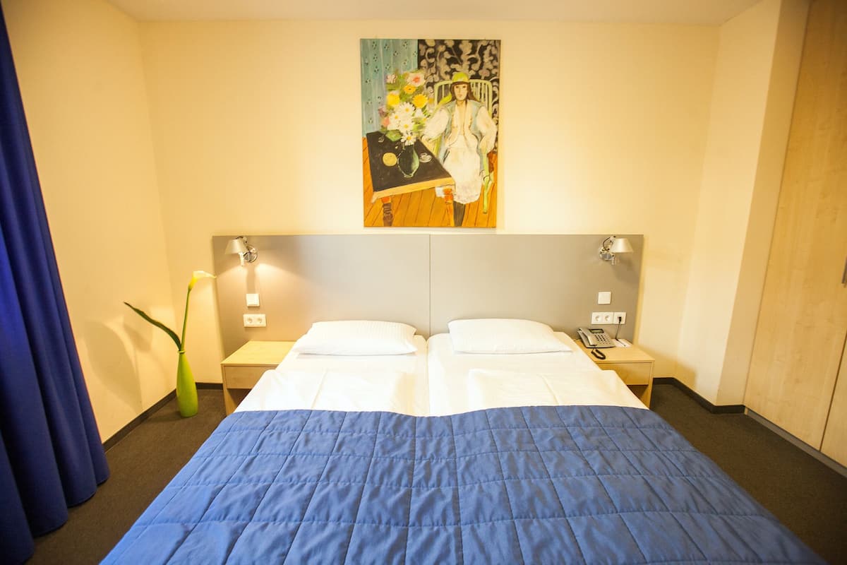 Superior Twin Room | In-room safe, iron/ironing board, free cribs/infant beds, free WiFi