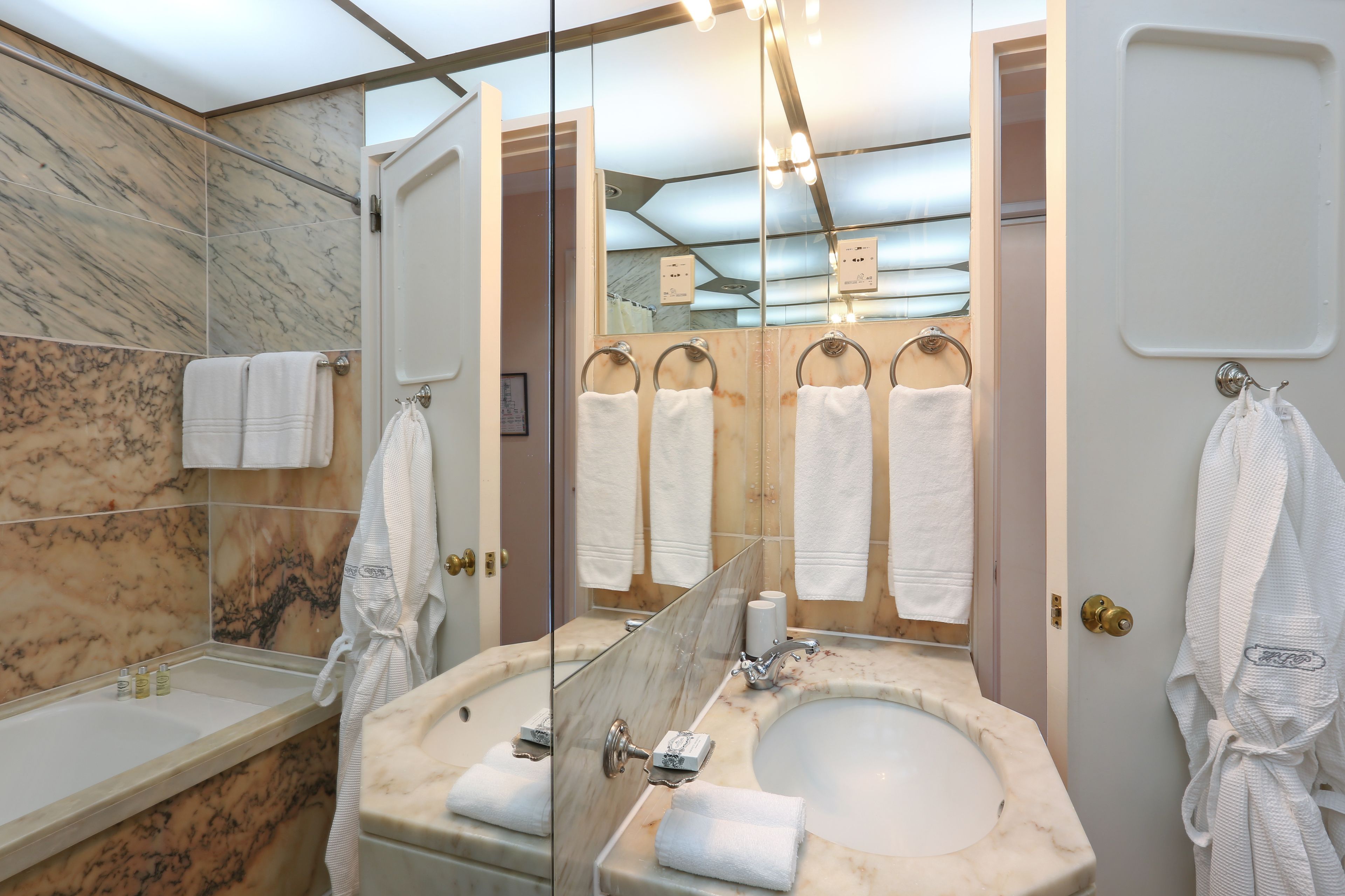 combined shower/bathtub, deep-soaking bathtub, designer toiletries