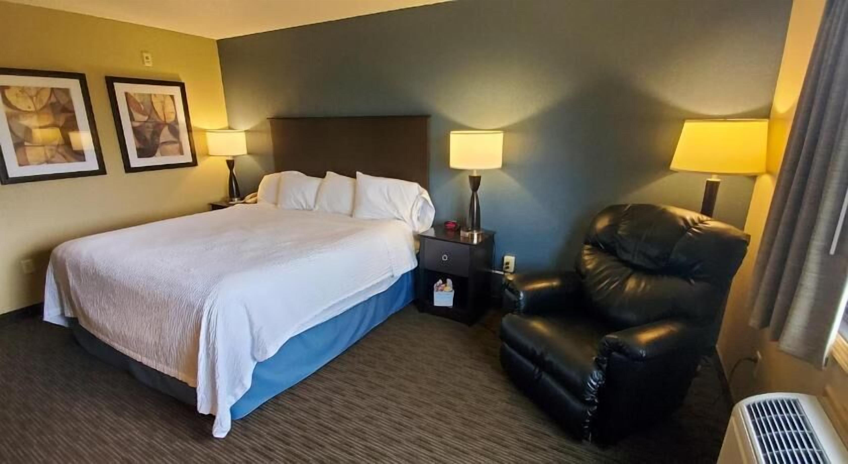 Desk, laptop workspace, blackout drapes, iron/ironing board