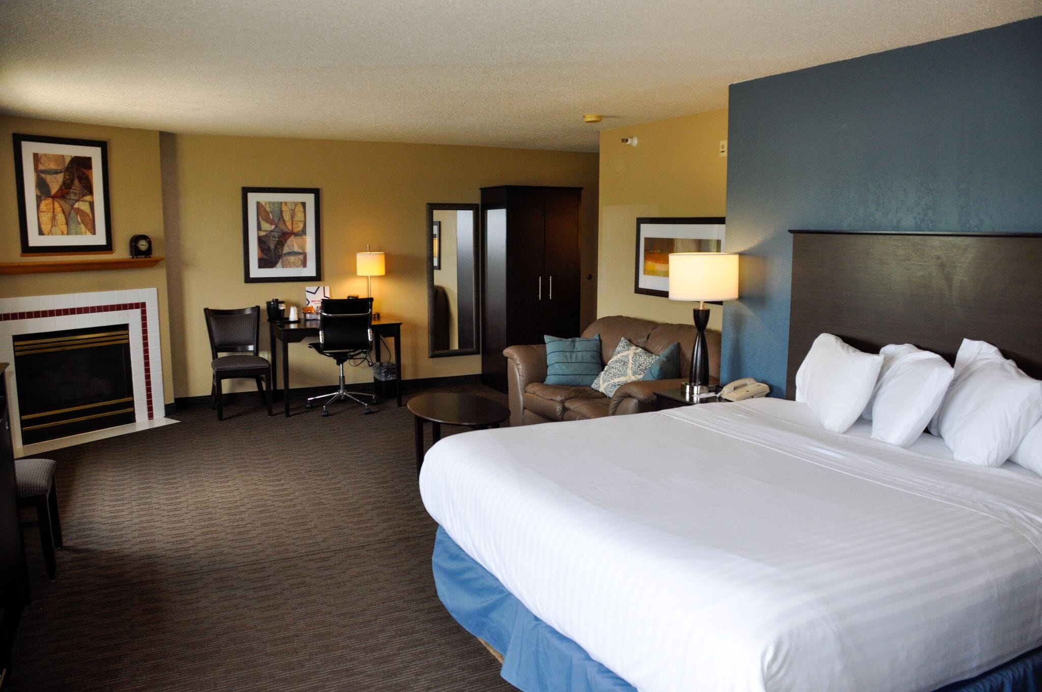 Premier Studio Suite, 1 King Bed, Non Smoking | Desk, laptop workspace, blackout drapes, iron/ironing board