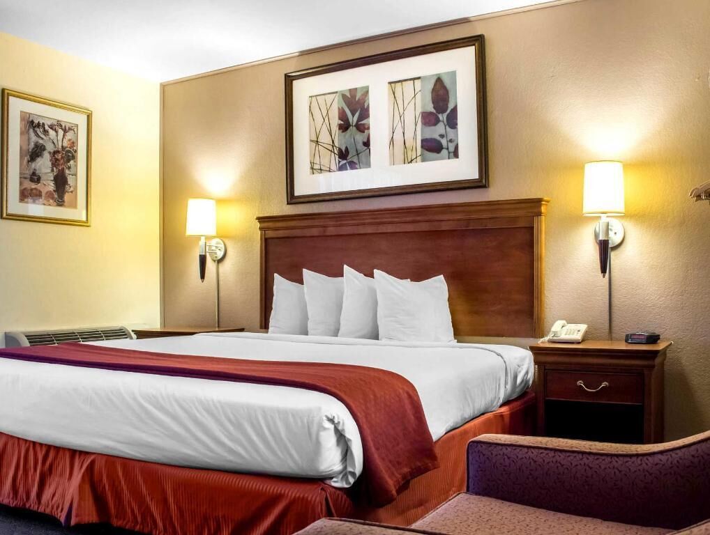 Premium bedding, desk, blackout drapes, iron/ironing board