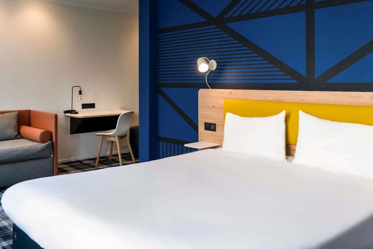 Standard Suite, Multiple Beds | Minibar, in-room safe, desk, soundproofing