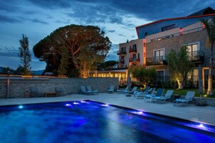 Outdoor pool, open 10:00 AM to 7:00 PM, sun loungers