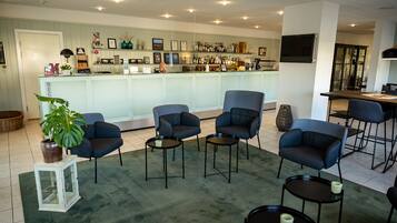 A bar area with seating and a counter.