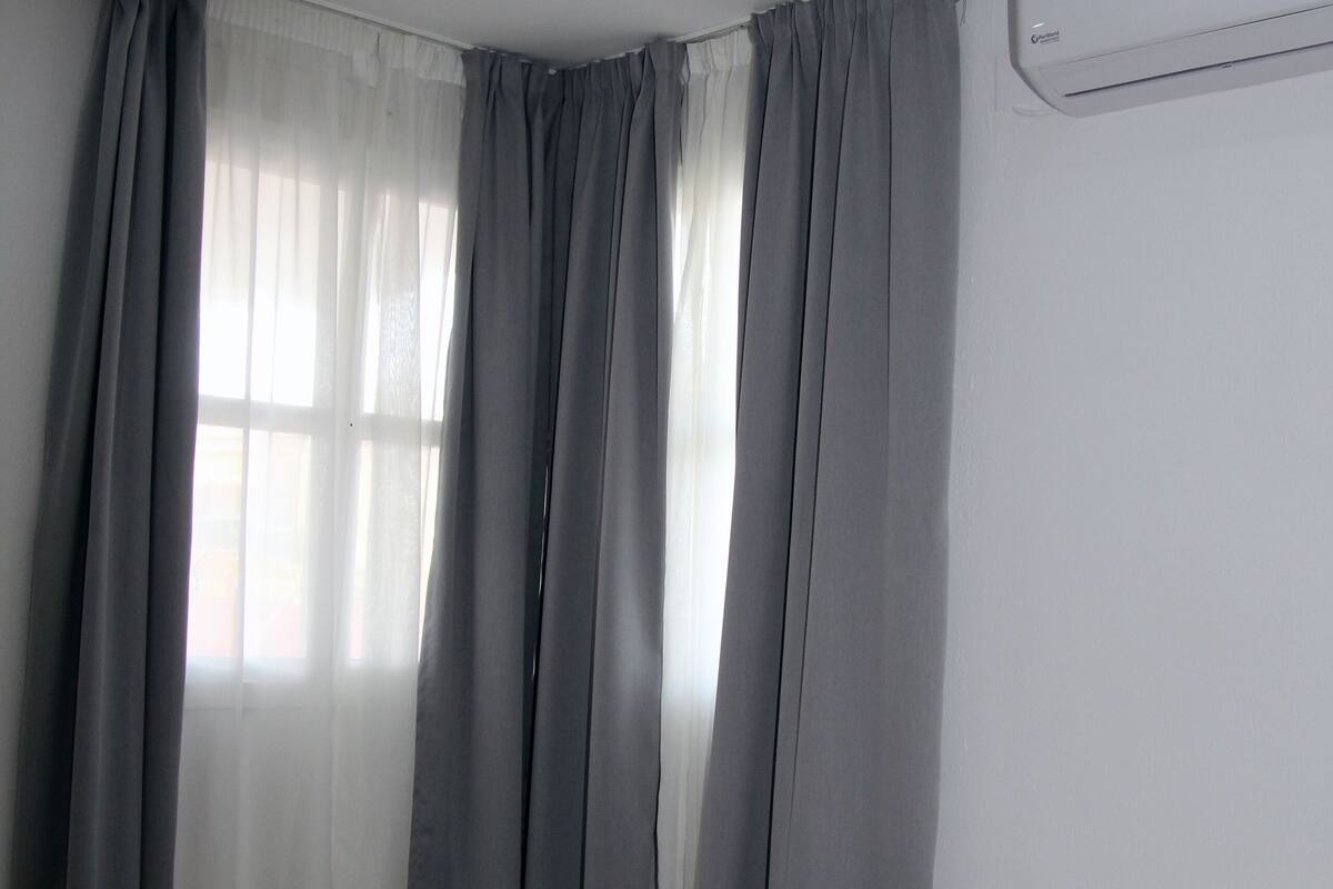 1 bedroom, premium bedding, laptop workspace, bed sheets