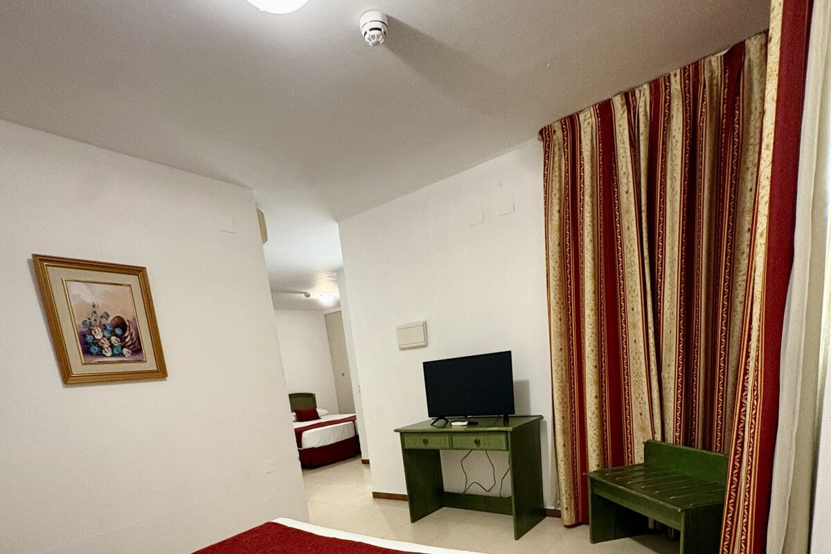 1 bedroom, premium bedding, laptop workspace, bed sheets