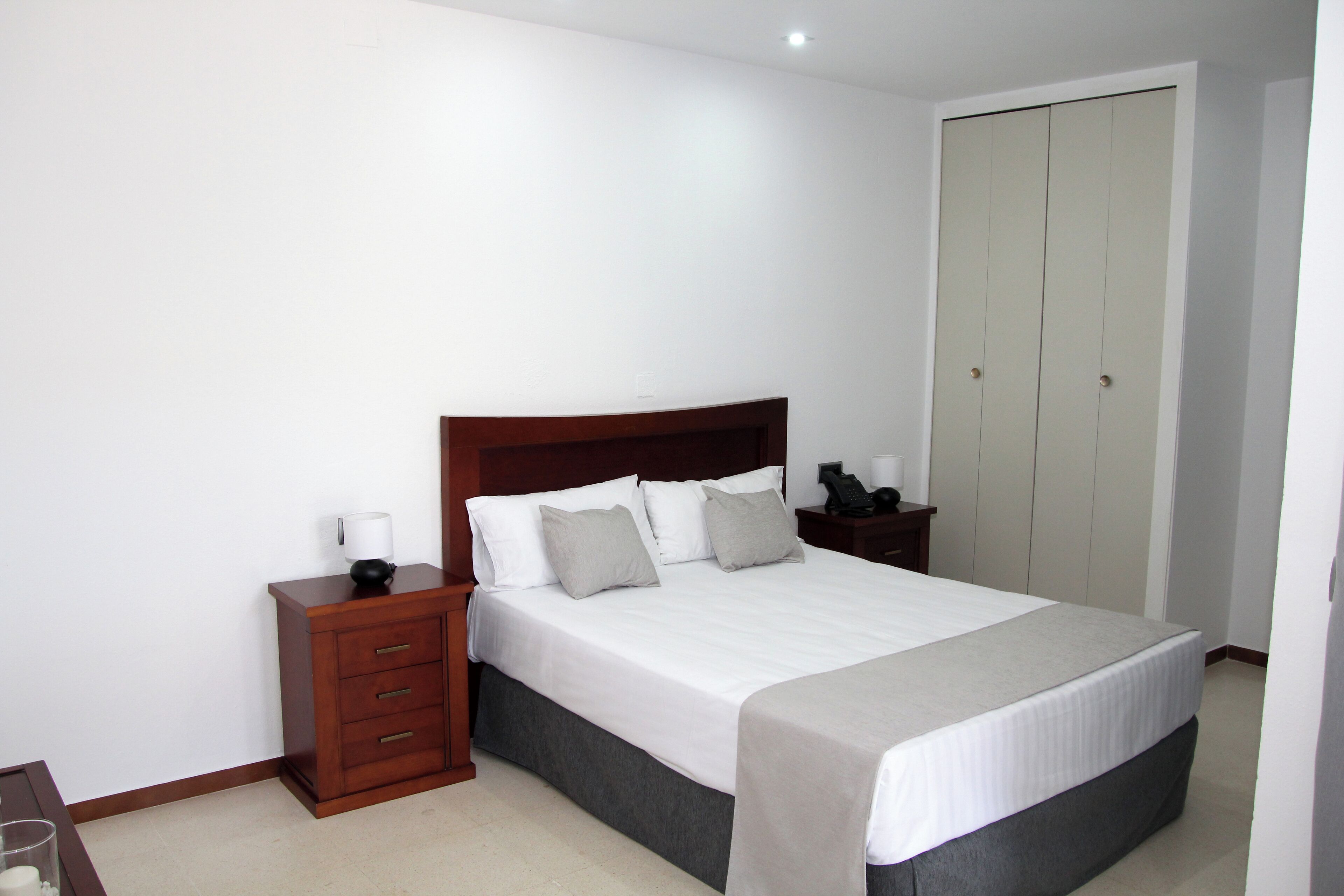 1 bedroom, premium bedding, laptop workspace, bed sheets