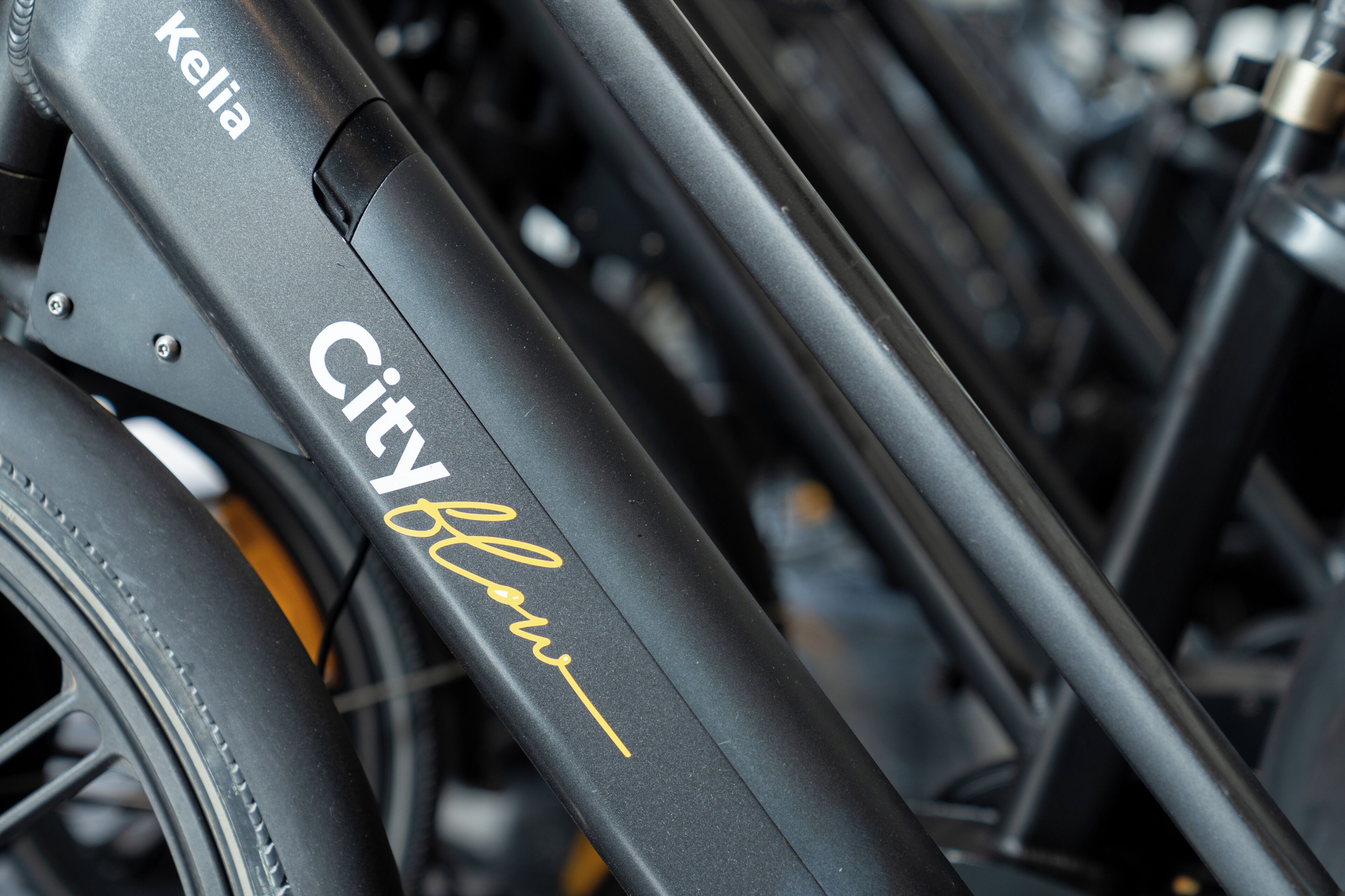 A close-up of a bicycle with 'City Bike' written on the frame.
