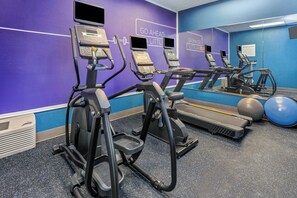 A gym with treadmills, elliptical machines, and exercise balls. - Holiday Inn Express Hotel & Suites Chicago-Algonquin by IHG (Algonquin)