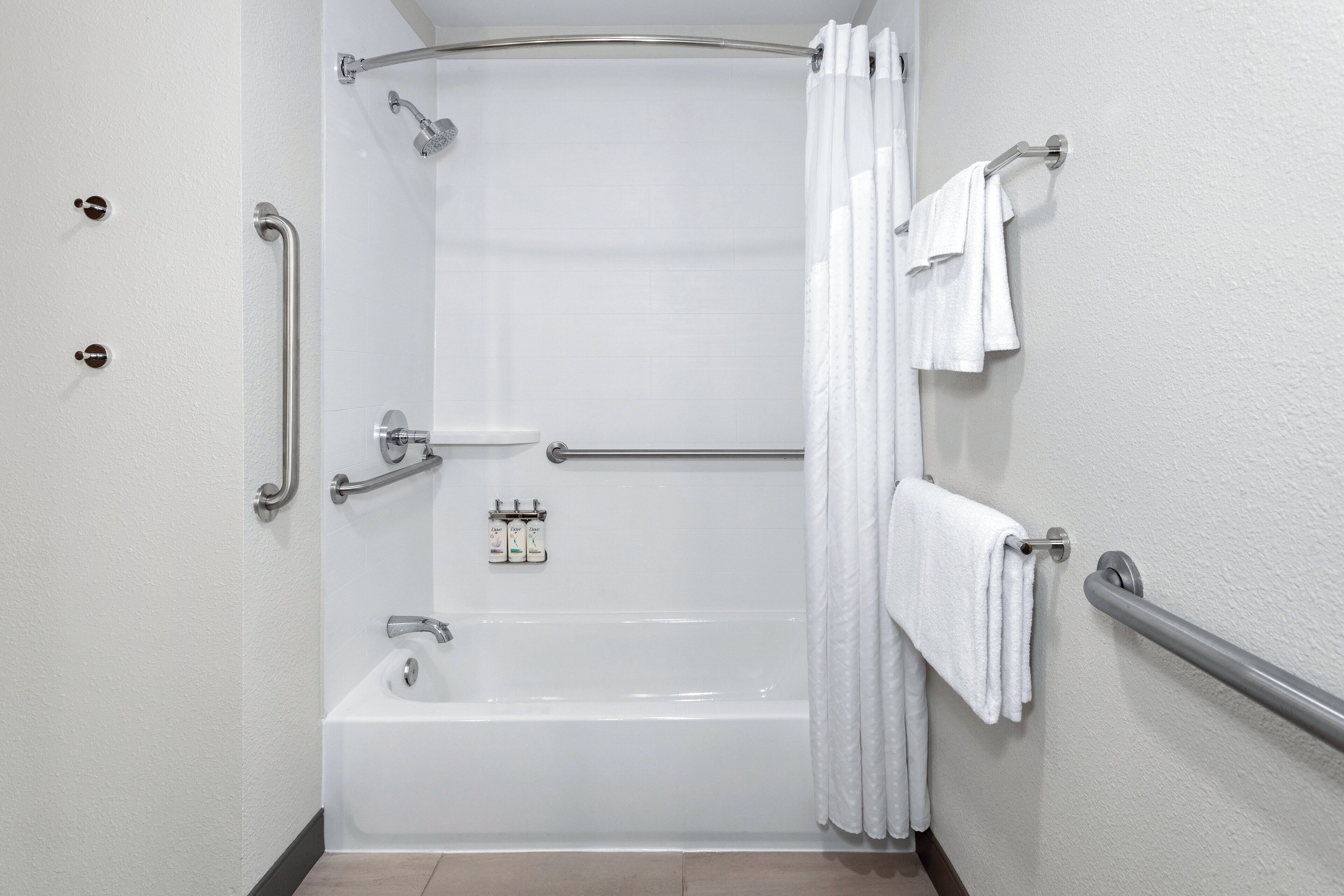 suite, 1 king bed, mobility accessible (communications, accessible tub) | bathroom | free toiletries, hair dryer, towels, soap