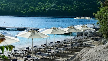 Private beach, sun-loungers, beach towels, beach bar