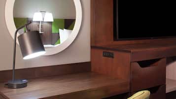 Desk, laptop workspace, blackout drapes, iron/ironing board