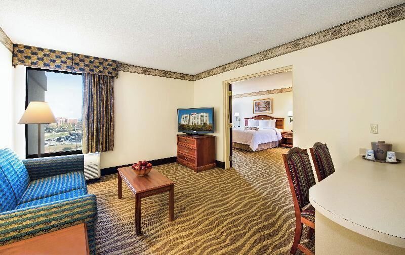 Desk, laptop workspace, blackout curtains, iron/ironing board
