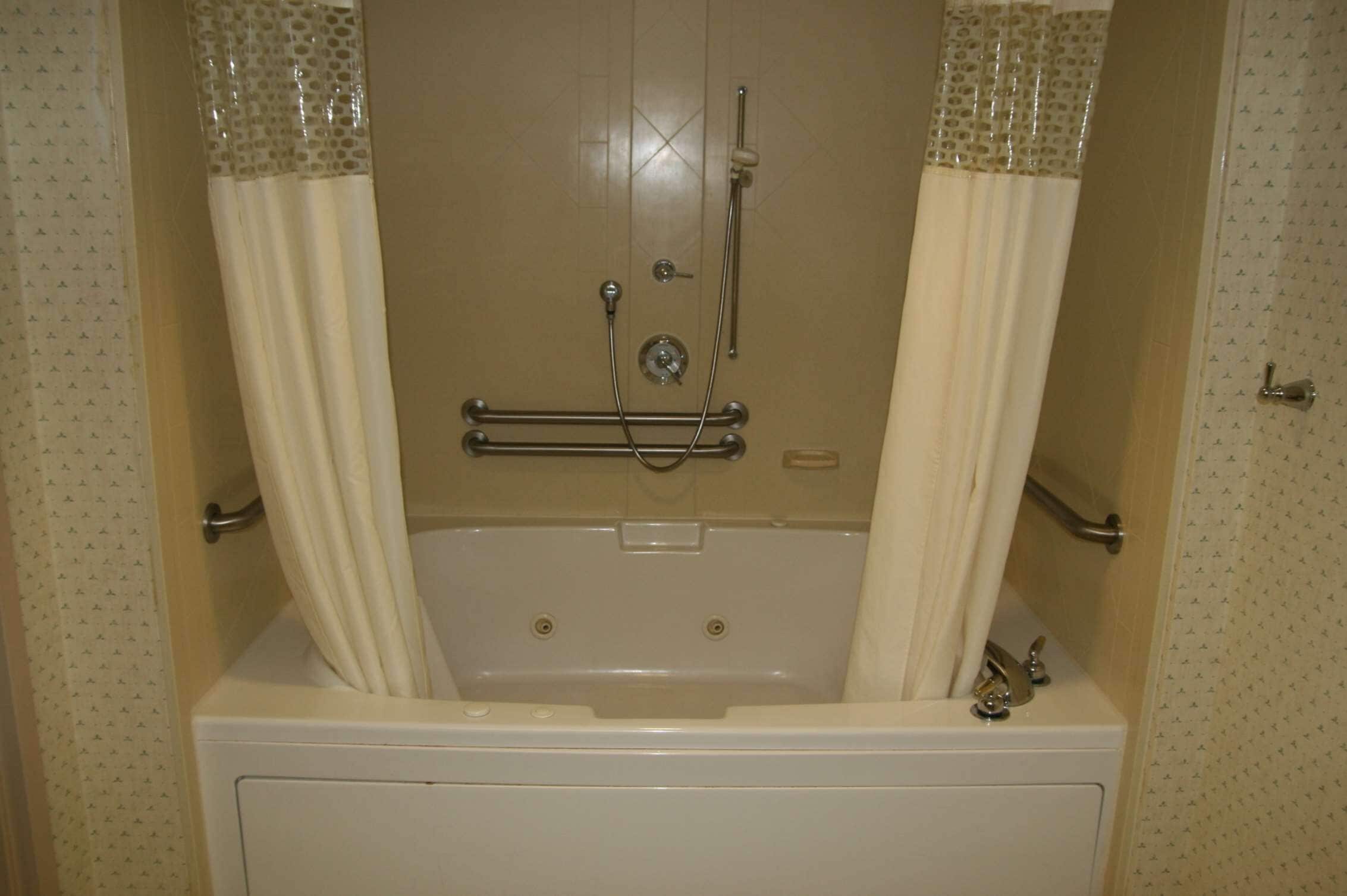 suite, 1 king bed | bathroom shower