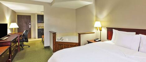 Suite, 1 King Bed | Free cribs/infant beds, free rollaway beds, free WiFi, bed sheets