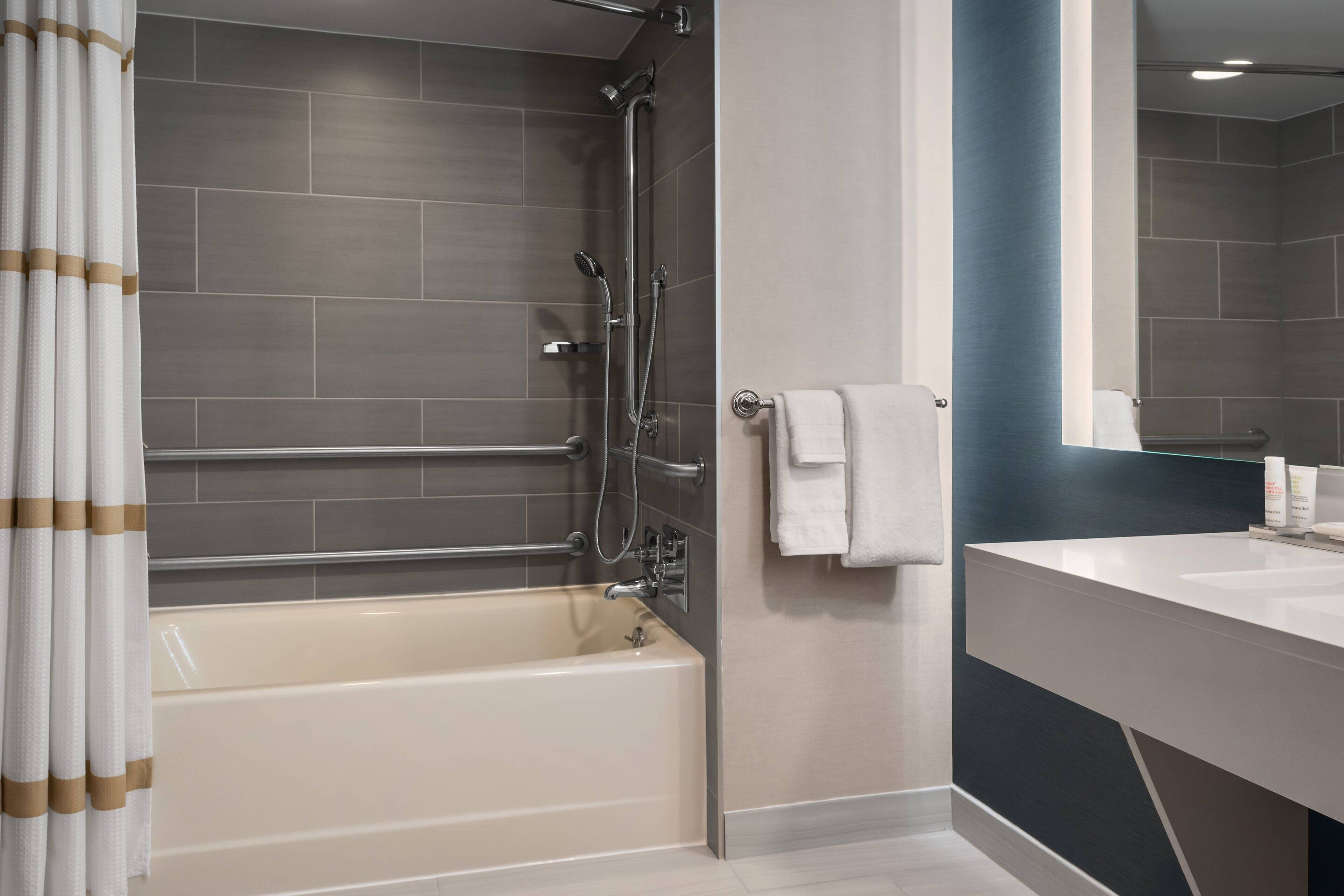 combined shower/bathtub, free toiletries, hair dryer, towels