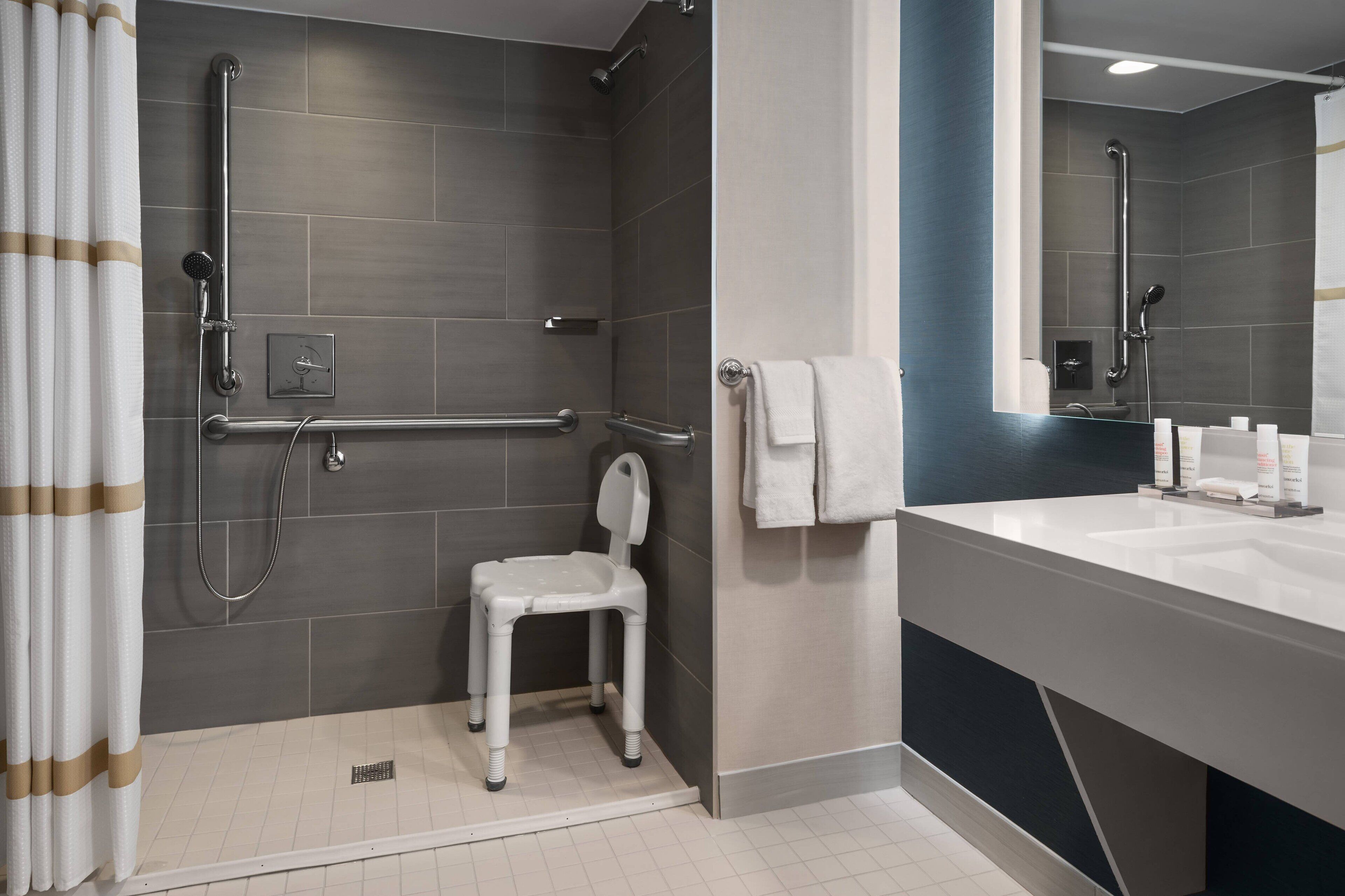 combined shower/bathtub, free toiletries, hair dryer, towels