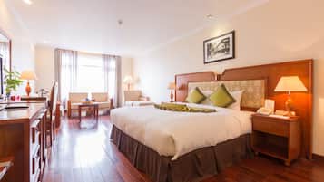 Habitación ejecutiva, 1 cama King size | Ropa de cama de alta calidad y minibar