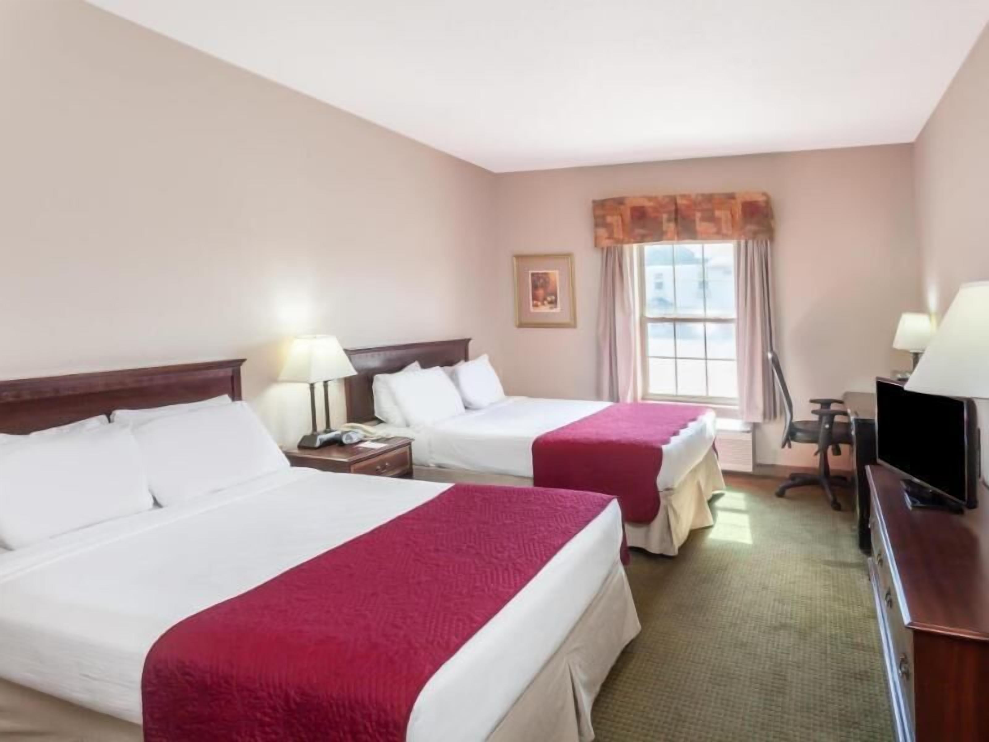 Pillow-top beds, in-room safe, desk, iron/ironing board