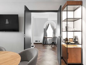 Junior Suite, 1 King Bed with Sofa bed | In-room safe, desk, laptop workspace, blackout drapes