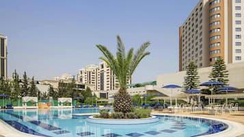 Outdoor pool, pool umbrellas, sun loungers