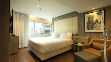 Quarto Luxo King | 迷你吧、客房内保险箱、办公桌、遮光窗帘