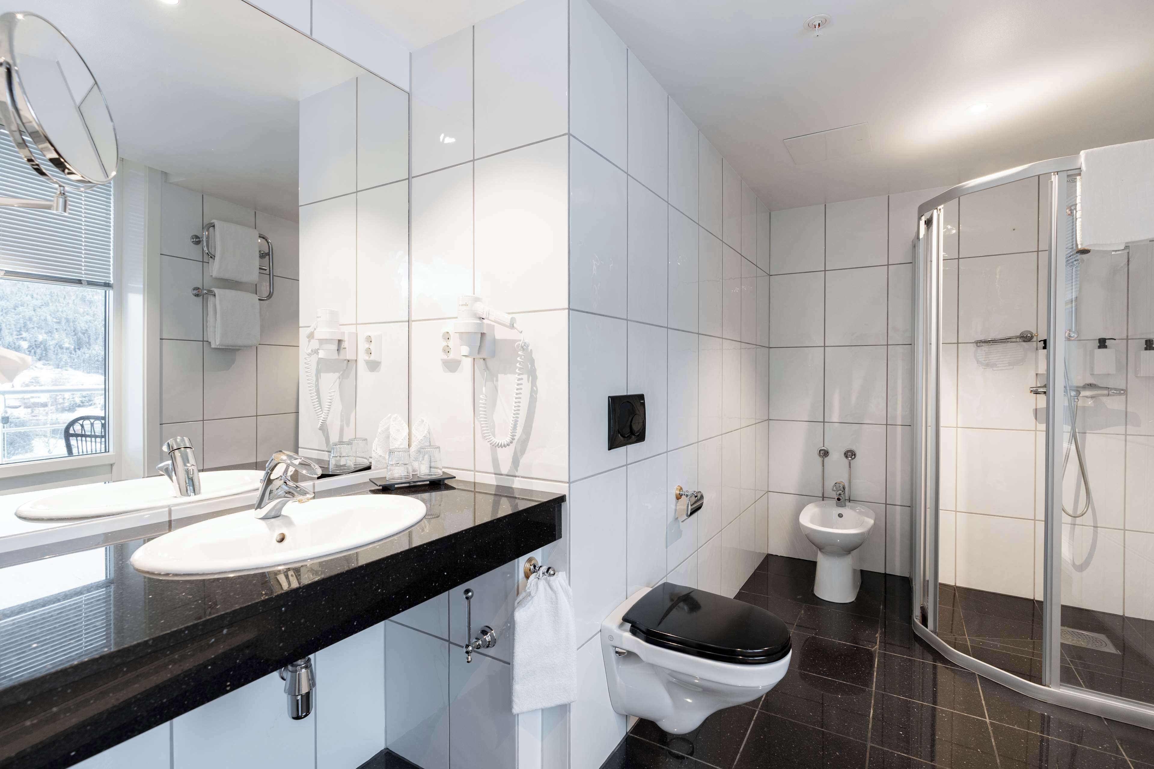 junior suite | bathroom | hair dryer, towels