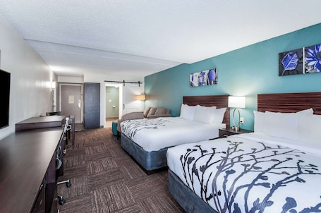 2 Queen Beds, Suite, Nonsmoking, Upgrade | In-room safe, desk, laptop workspace, blackout drapes. Sleep Inn & Suites Rehoboth Beach