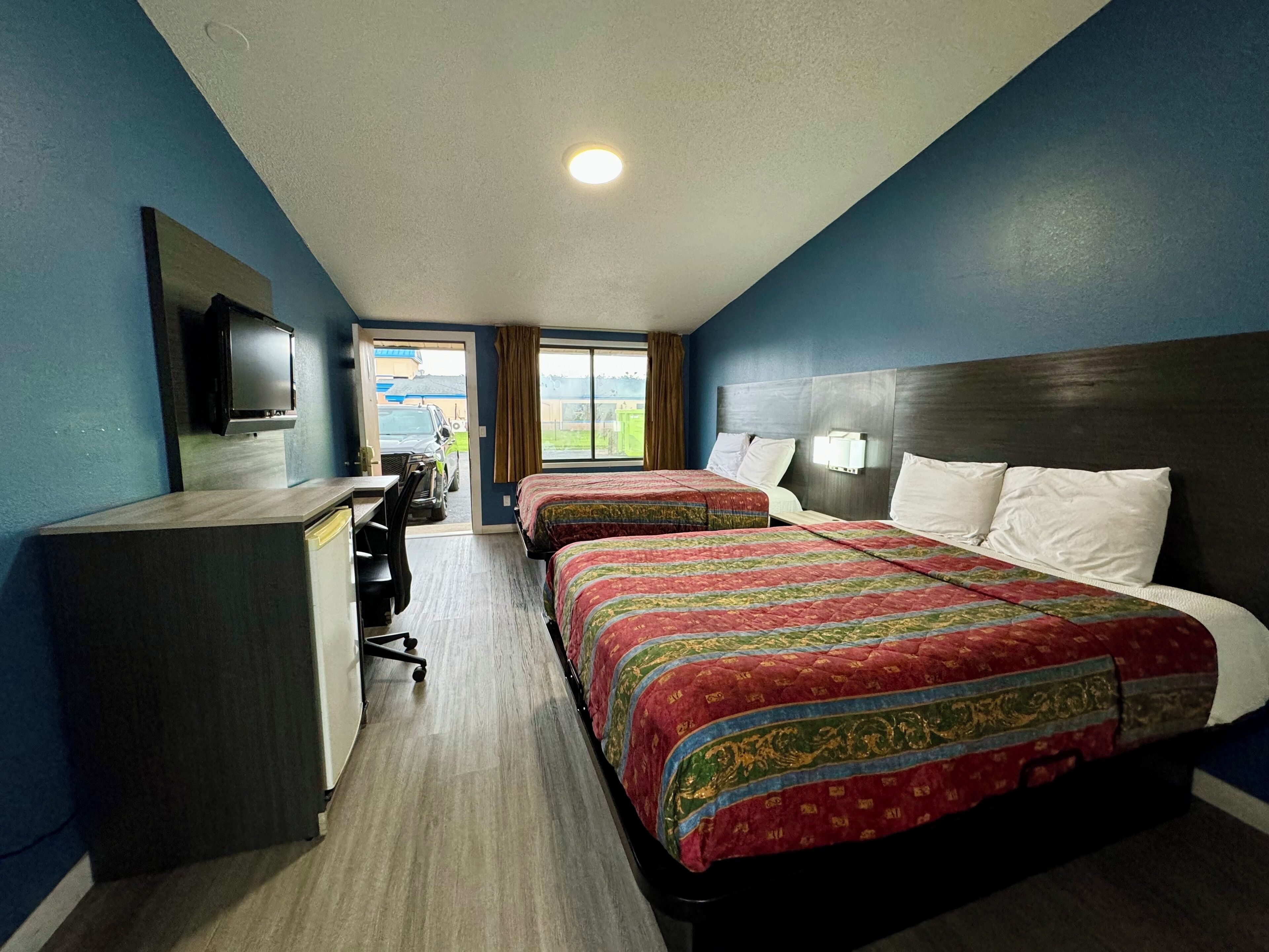 Room, 2 Double Beds | In-room safe, blackout drapes, rollaway beds, free WiFi