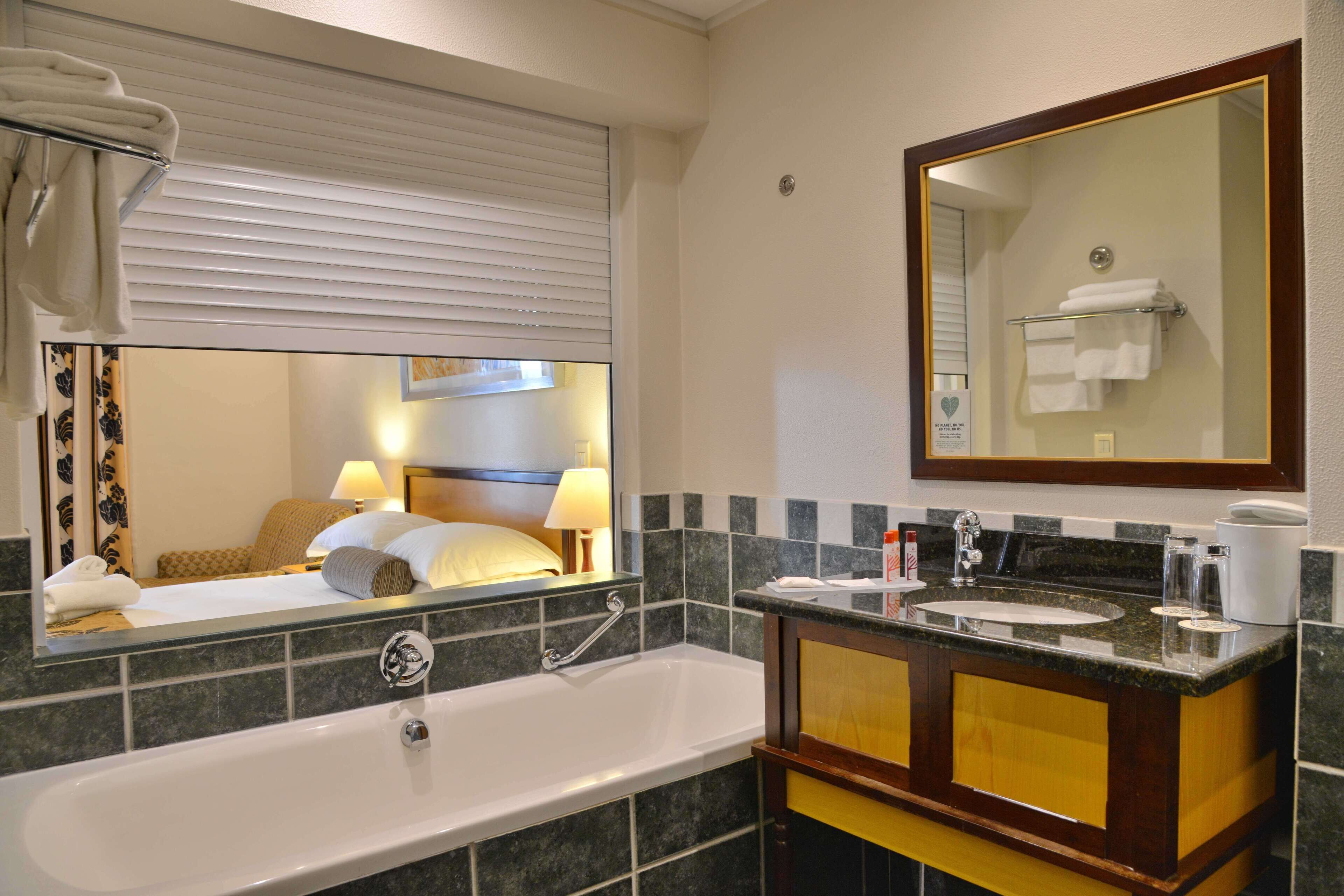 separate bathtub and shower, free toiletries, hair dryer, towels