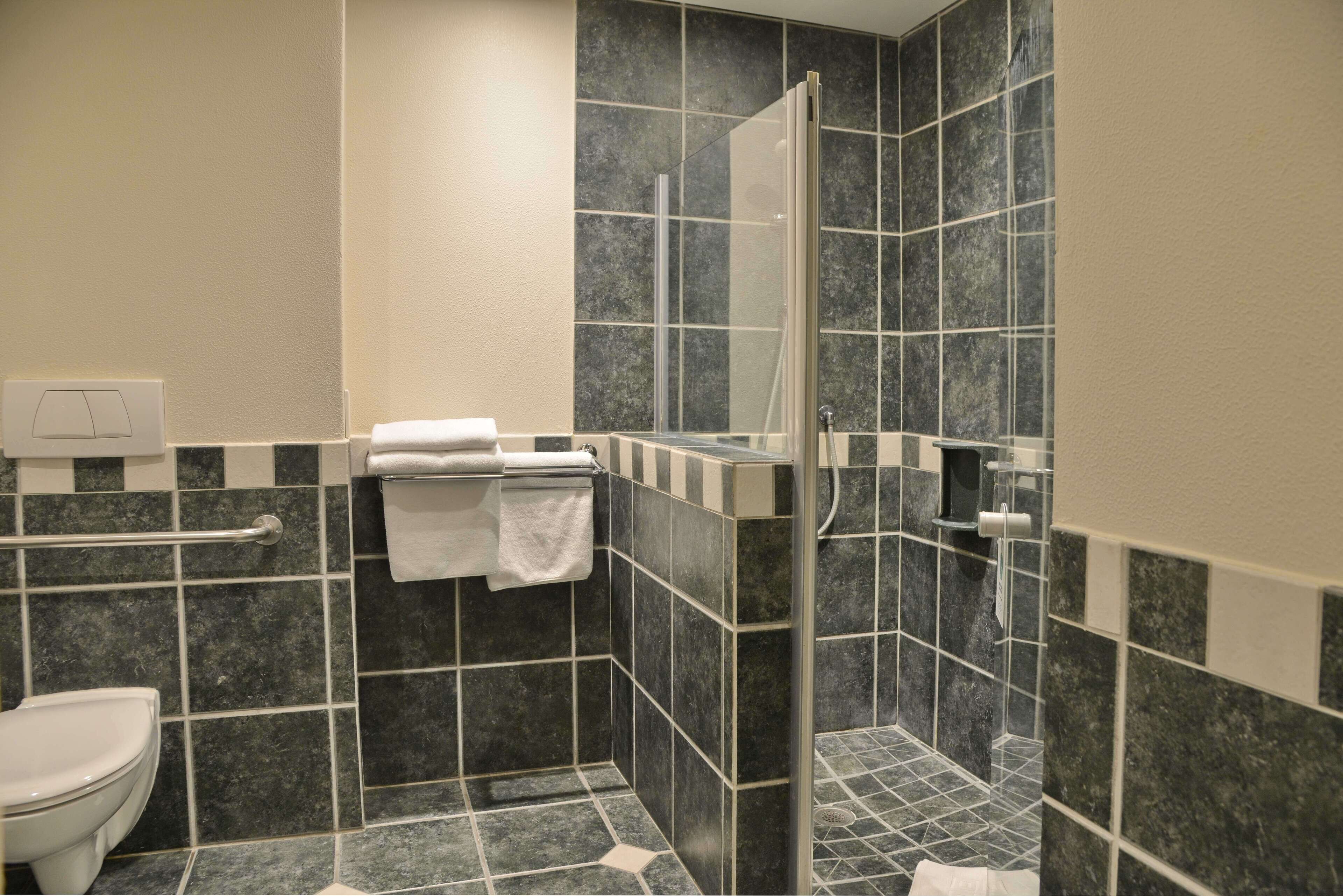 separate bathtub and shower, free toiletries, hair dryer, towels