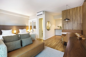 Suite Executive Solteiro | Frigobar, cofres nos quartos, cortinas blackout, Wi-Fi de cortesia
