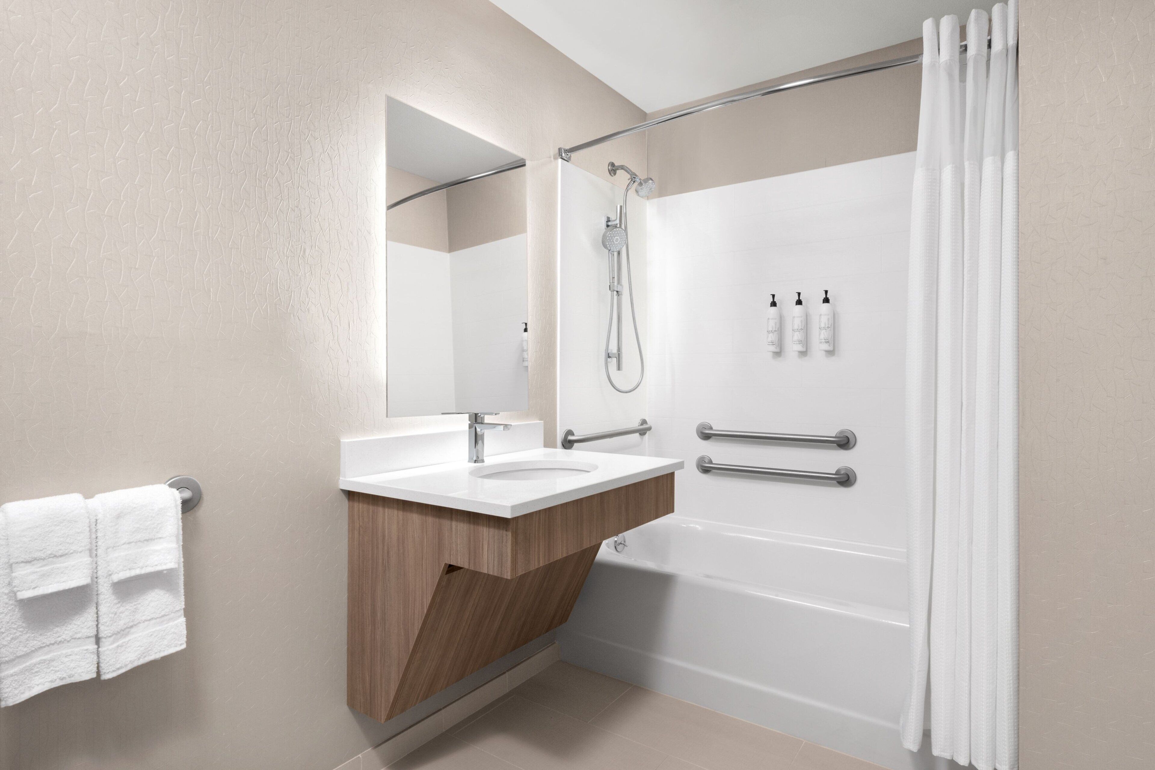 combined shower/bathtub, free toiletries, hair dryer, towels