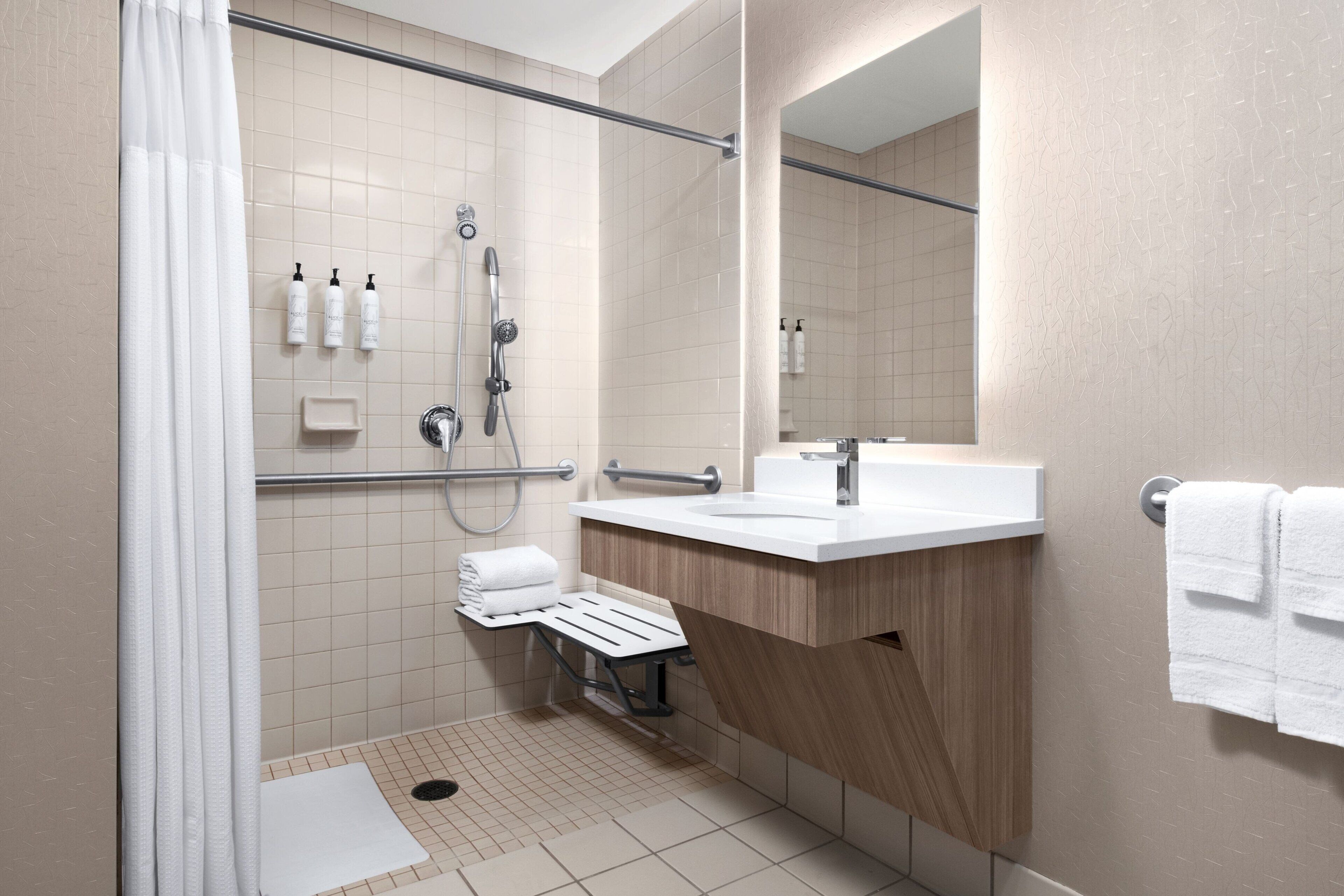 combined shower/bathtub, free toiletries, hair dryer, towels