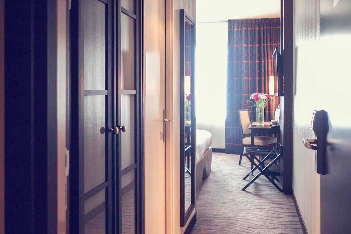 desk, blackout curtains, soundproofing, iron/ironing board