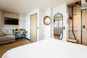 Premium bedding, desk, blackout curtains, soundproofing